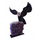 Black eagle in dolomite on amethyst cluster